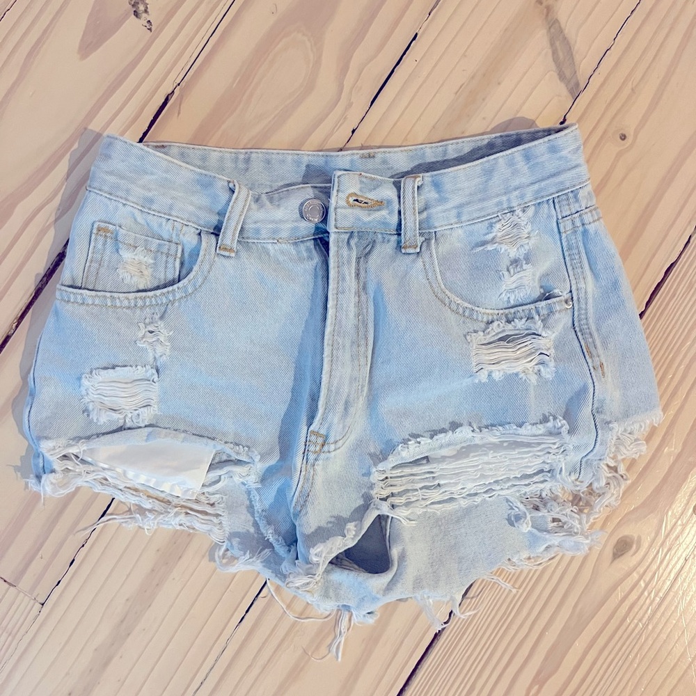 light wash ripped jean shorts